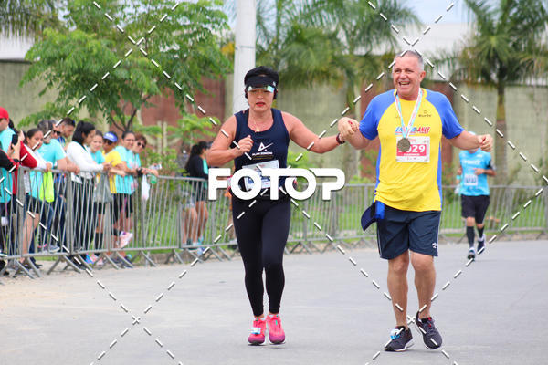 Buy your photos of the eventMEIA MARATONA DE JACARE  on Fotop