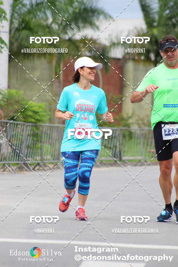 Buy your photos of the eventMEIA MARATONA DE JACARE  on Fotop