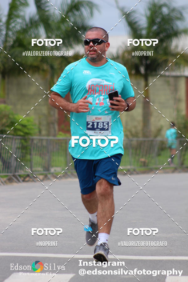 Buy your photos of the eventMEIA MARATONA DE JACARE  on Fotop