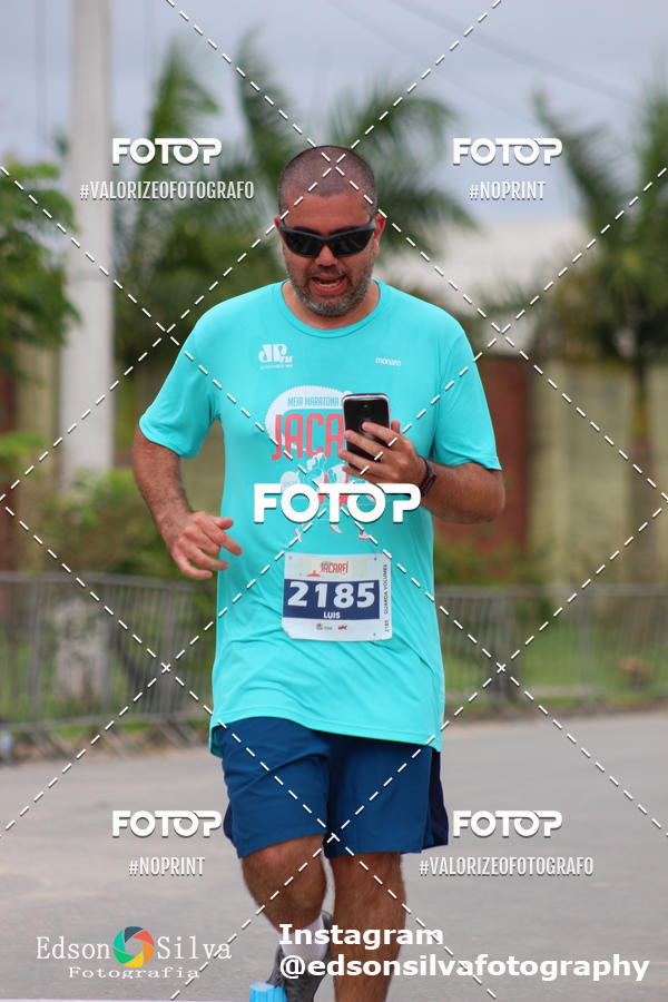 Buy your photos of the eventMEIA MARATONA DE JACARE  on Fotop