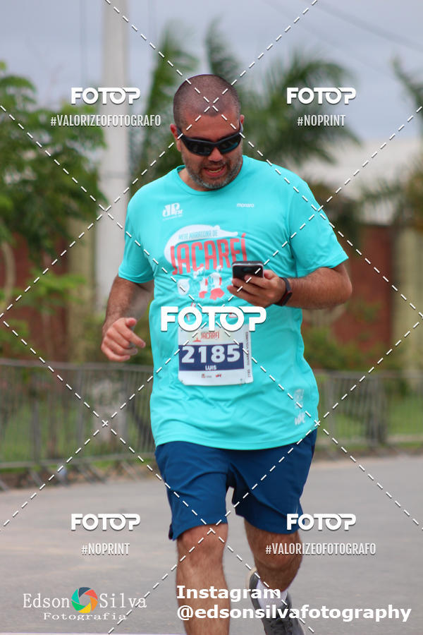Buy your photos of the eventMEIA MARATONA DE JACARE  on Fotop