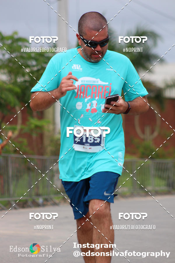 Buy your photos of the eventMEIA MARATONA DE JACARE  on Fotop