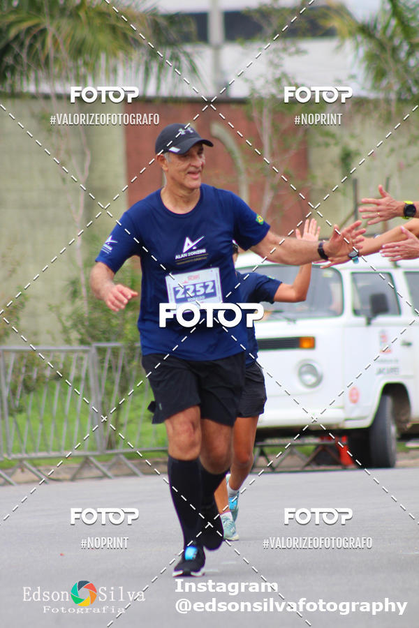Buy your photos of the eventMEIA MARATONA DE JACARE  on Fotop