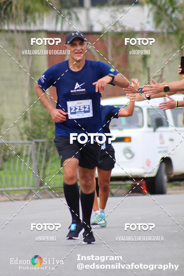 Buy your photos of the eventMEIA MARATONA DE JACARE  on Fotop