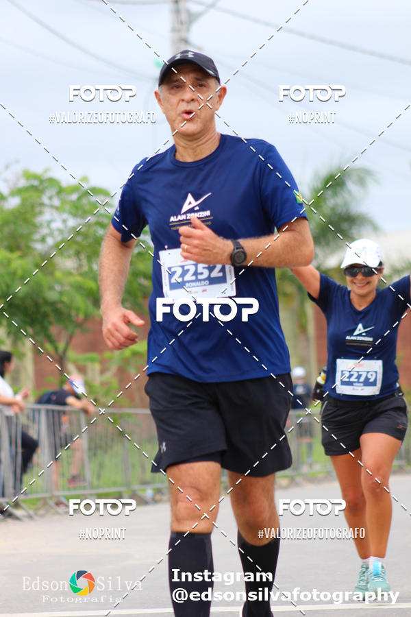 Buy your photos of the eventMEIA MARATONA DE JACARE  on Fotop