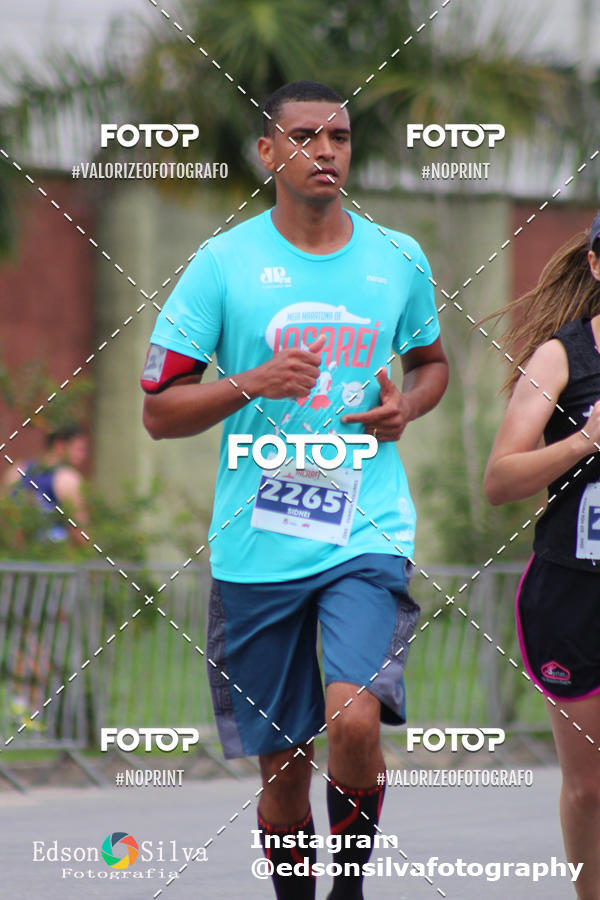 Buy your photos of the eventMEIA MARATONA DE JACARE  on Fotop