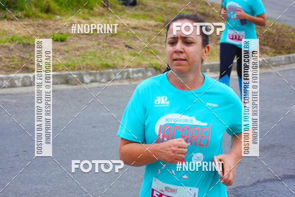 Buy your photos of the eventMEIA MARATONA DE JACARE  on Fotop