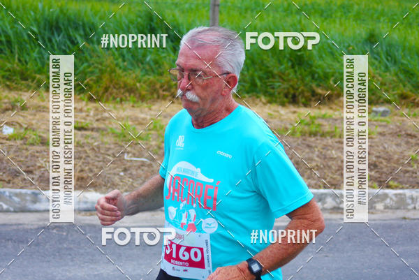 Buy your photos of the eventMEIA MARATONA DE JACARE  on Fotop