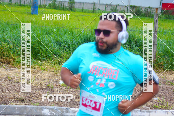 Buy your photos of the eventMEIA MARATONA DE JACARE  on Fotop