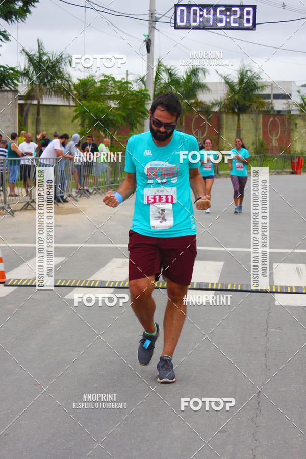 Buy your photos of the eventMEIA MARATONA DE JACARE  on Fotop