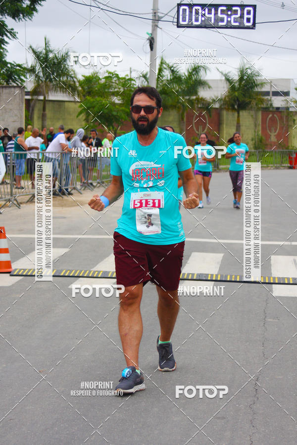 Buy your photos of the eventMEIA MARATONA DE JACARE  on Fotop