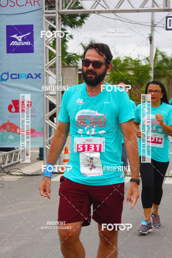 Buy your photos of the eventMEIA MARATONA DE JACARE  on Fotop