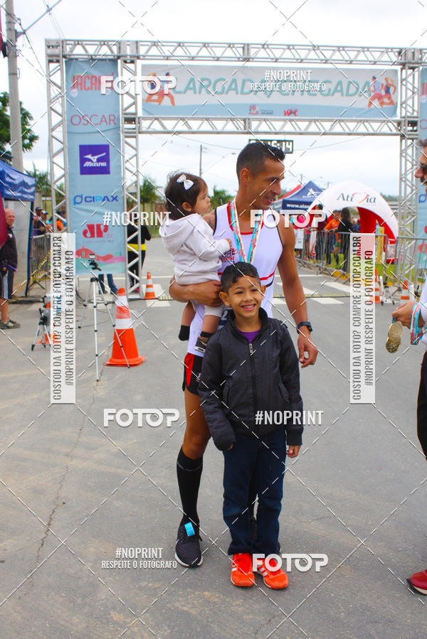 Buy your photos of the eventMEIA MARATONA DE JACARE  on Fotop