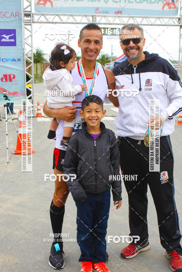 Buy your photos of the eventMEIA MARATONA DE JACARE  on Fotop