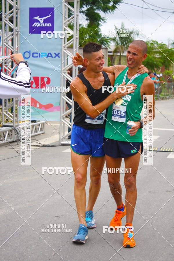 Buy your photos of the eventMEIA MARATONA DE JACARE  on Fotop
