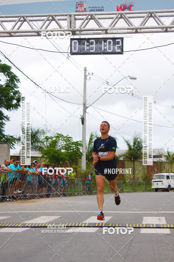 Buy your photos of the eventMEIA MARATONA DE JACARE  on Fotop