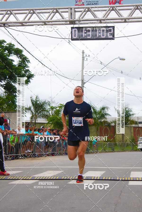 Buy your photos of the eventMEIA MARATONA DE JACARE  on Fotop