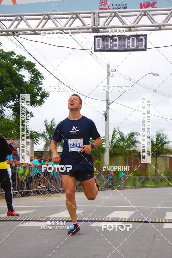 Buy your photos of the eventMEIA MARATONA DE JACARE  on Fotop