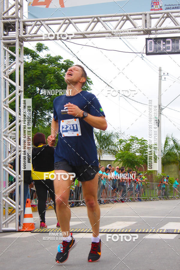 Buy your photos of the eventMEIA MARATONA DE JACARE  on Fotop