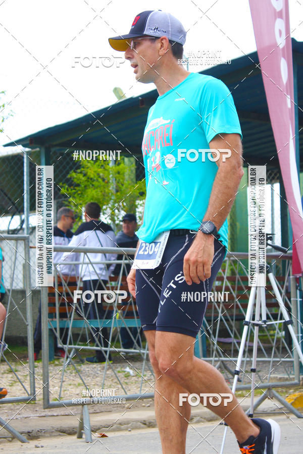 Buy your photos of the eventMEIA MARATONA DE JACARE  on Fotop