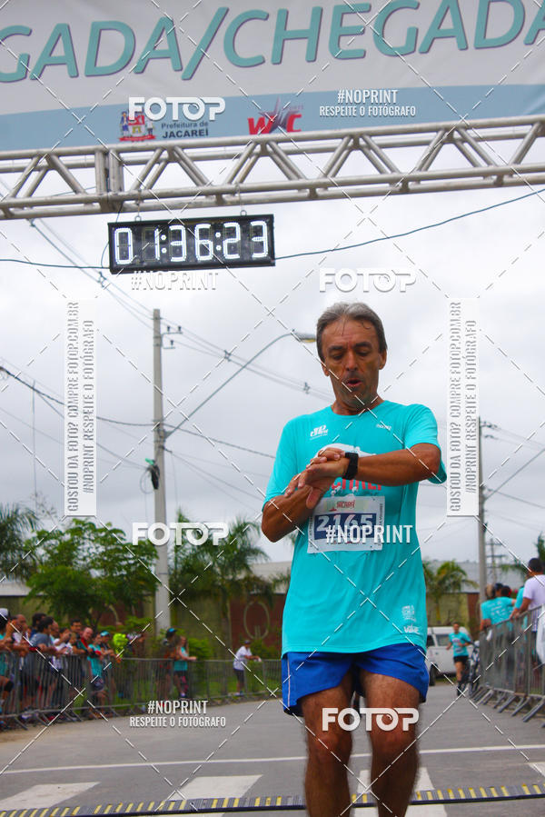 Buy your photos of the eventMEIA MARATONA DE JACARE  on Fotop