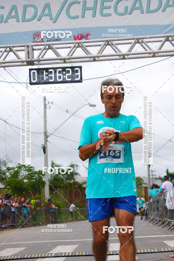 Buy your photos of the eventMEIA MARATONA DE JACARE  on Fotop