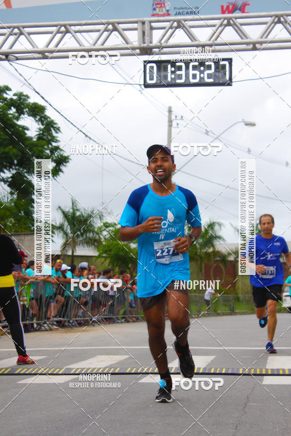 Buy your photos of the eventMEIA MARATONA DE JACARE  on Fotop