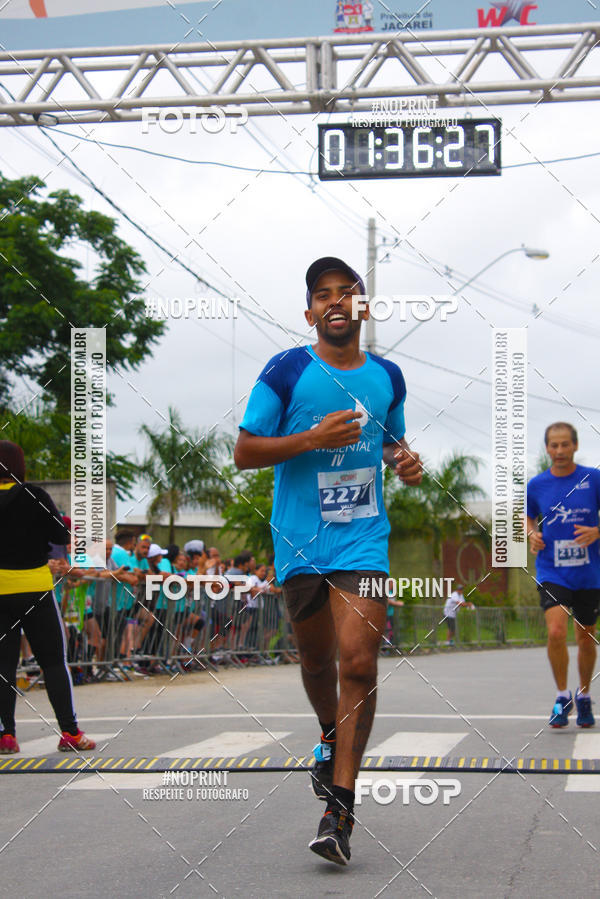 Buy your photos of the eventMEIA MARATONA DE JACARE  on Fotop