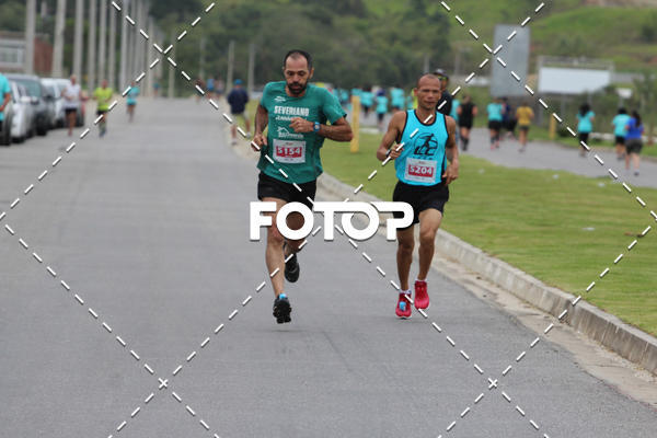 Buy your photos of the eventMEIA MARATONA DE JACARE  on Fotop