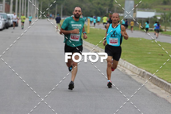 Buy your photos of the eventMEIA MARATONA DE JACARE  on Fotop