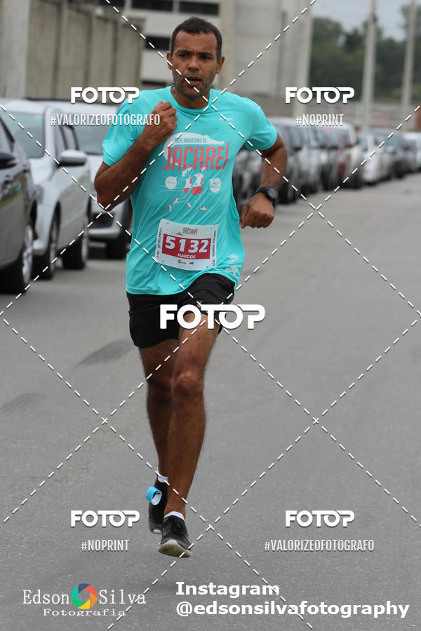 Buy your photos of the eventMEIA MARATONA DE JACARE  on Fotop