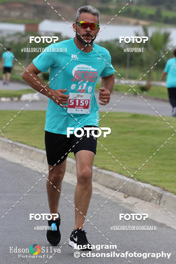 Buy your photos of the eventMEIA MARATONA DE JACARE  on Fotop