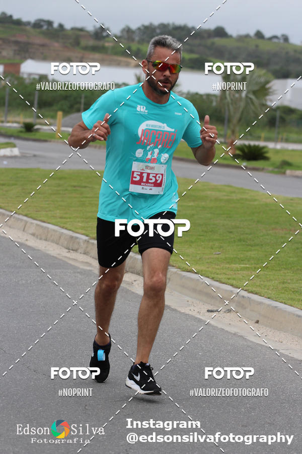 Buy your photos of the eventMEIA MARATONA DE JACARE  on Fotop