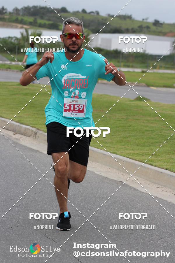 Buy your photos of the eventMEIA MARATONA DE JACARE  on Fotop