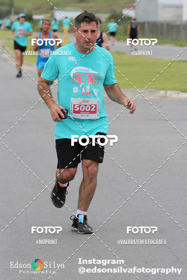 Buy your photos of the eventMEIA MARATONA DE JACARE  on Fotop