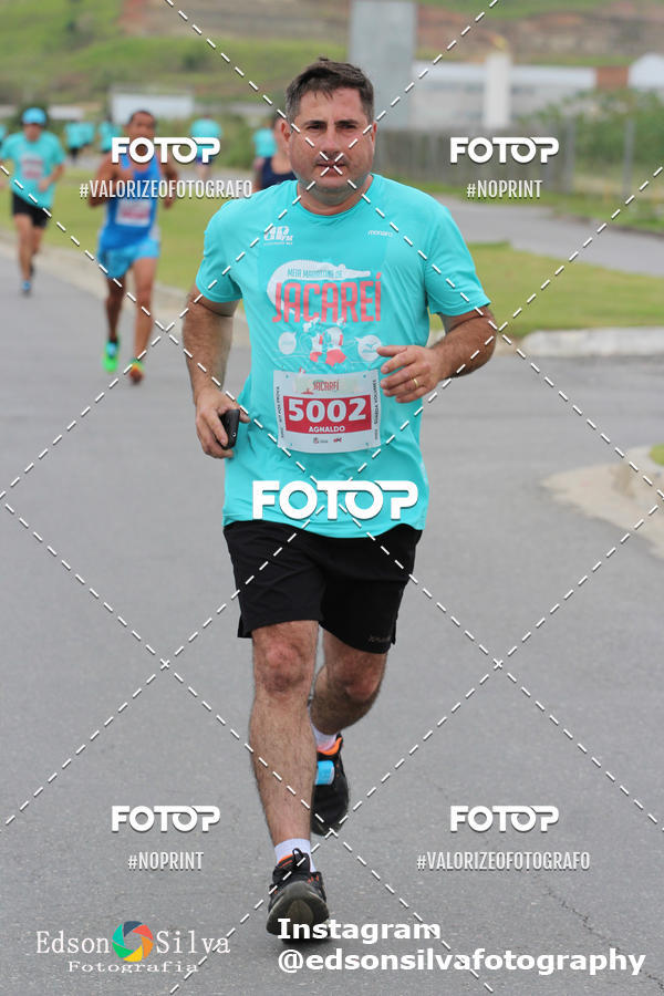 Buy your photos of the eventMEIA MARATONA DE JACARE  on Fotop