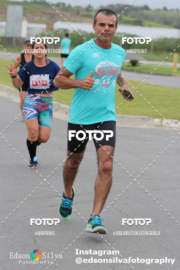 Buy your photos of the eventMEIA MARATONA DE JACARE  on Fotop