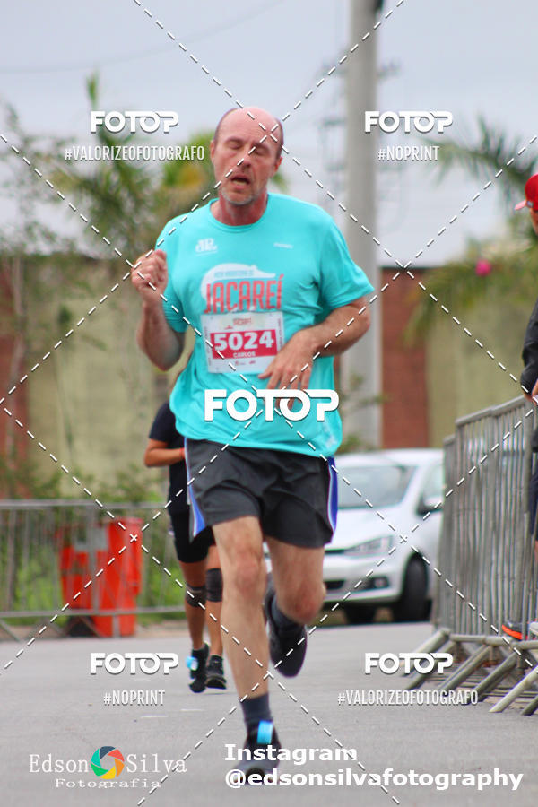 Buy your photos of the eventMEIA MARATONA DE JACARE  on Fotop