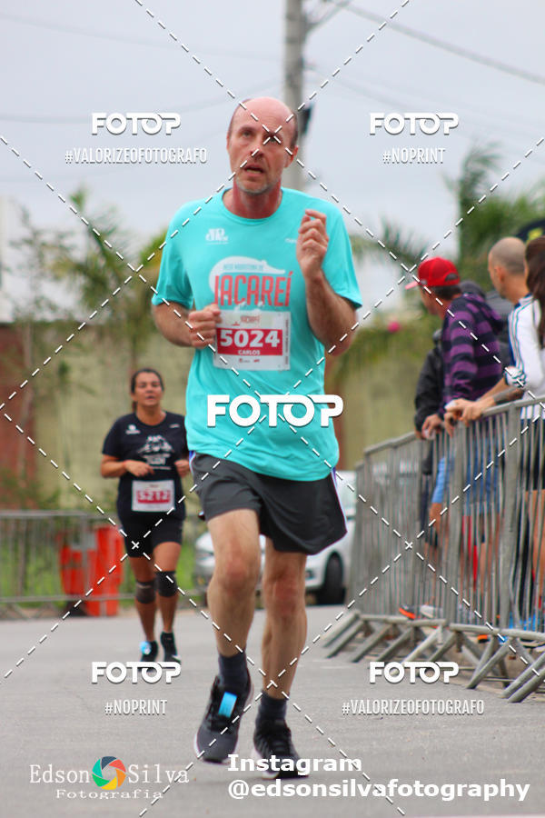 Buy your photos of the eventMEIA MARATONA DE JACARE  on Fotop