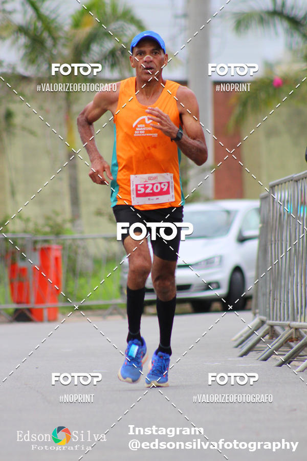 Buy your photos of the eventMEIA MARATONA DE JACARE  on Fotop