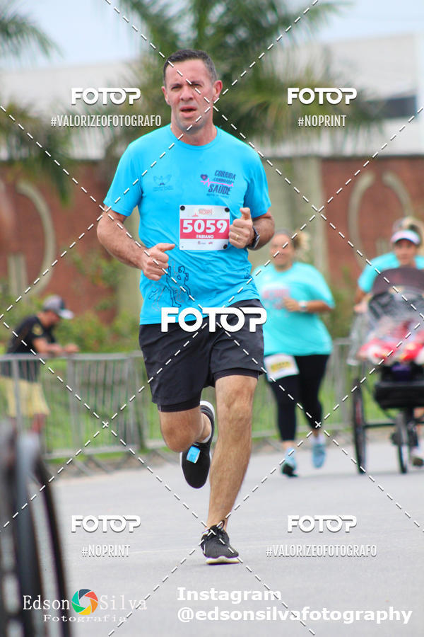 Buy your photos of the eventMEIA MARATONA DE JACARE  on Fotop
