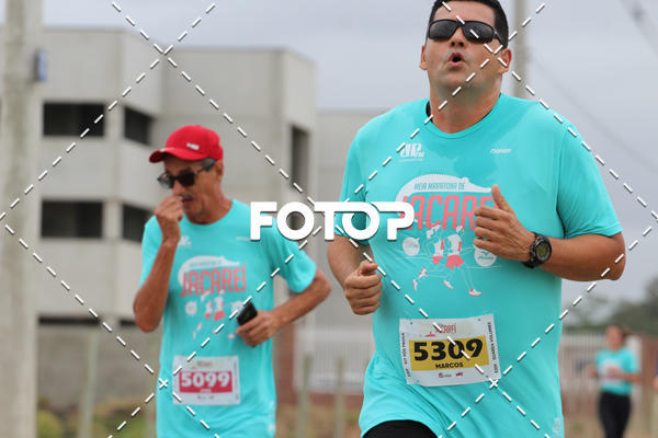 Buy your photos of the eventMEIA MARATONA DE JACARE  on Fotop