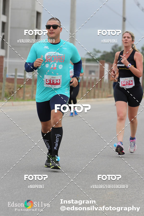Buy your photos of the eventMEIA MARATONA DE JACARE  on Fotop