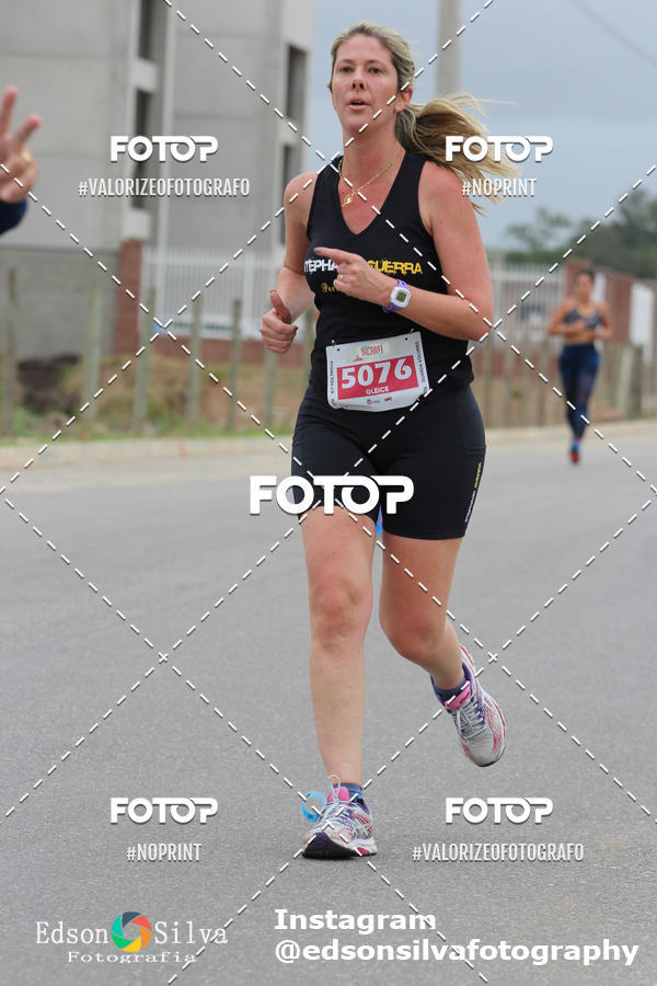Buy your photos of the eventMEIA MARATONA DE JACARE  on Fotop