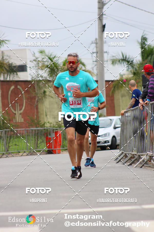 Buy your photos of the eventMEIA MARATONA DE JACARE  on Fotop