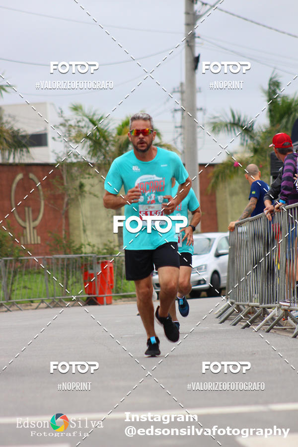 Buy your photos of the eventMEIA MARATONA DE JACARE  on Fotop
