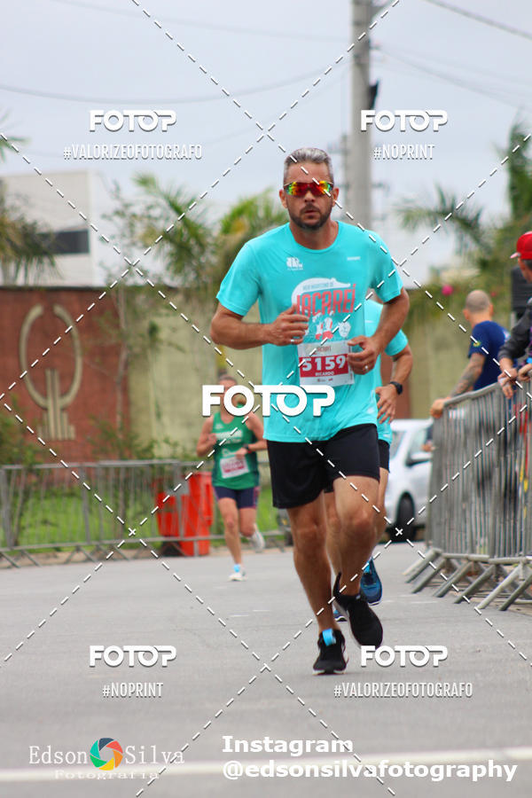 Buy your photos of the eventMEIA MARATONA DE JACARE  on Fotop