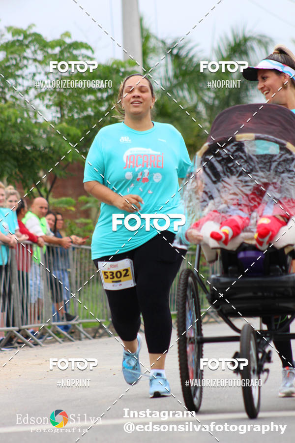 Buy your photos of the eventMEIA MARATONA DE JACARE  on Fotop