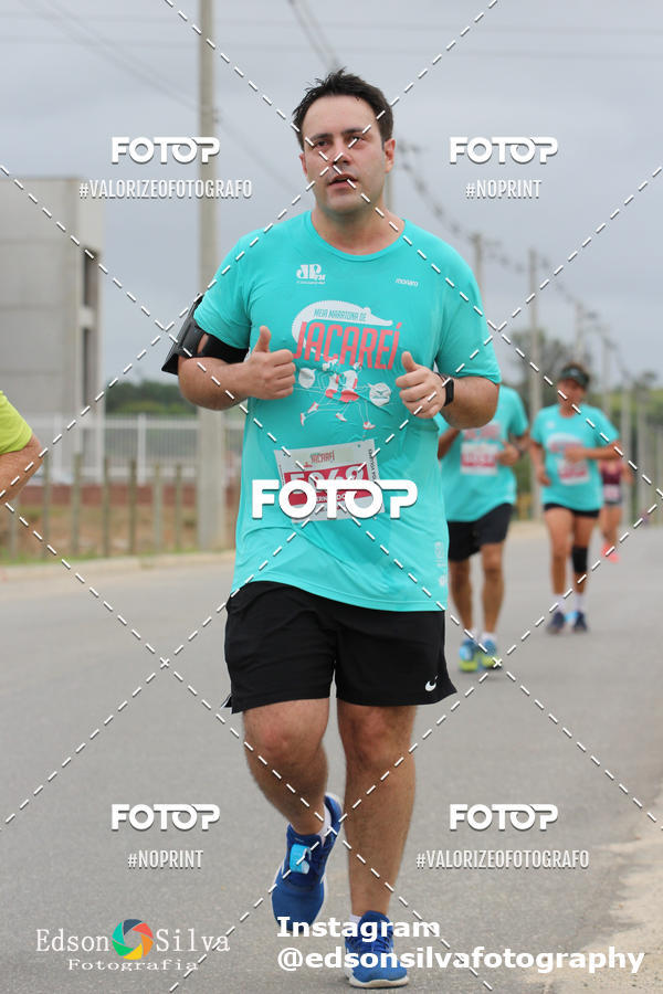 Buy your photos of the eventMEIA MARATONA DE JACARE  on Fotop