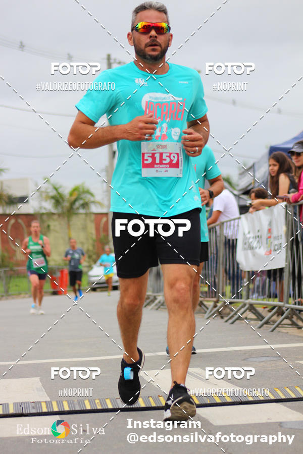 Buy your photos of the eventMEIA MARATONA DE JACARE  on Fotop